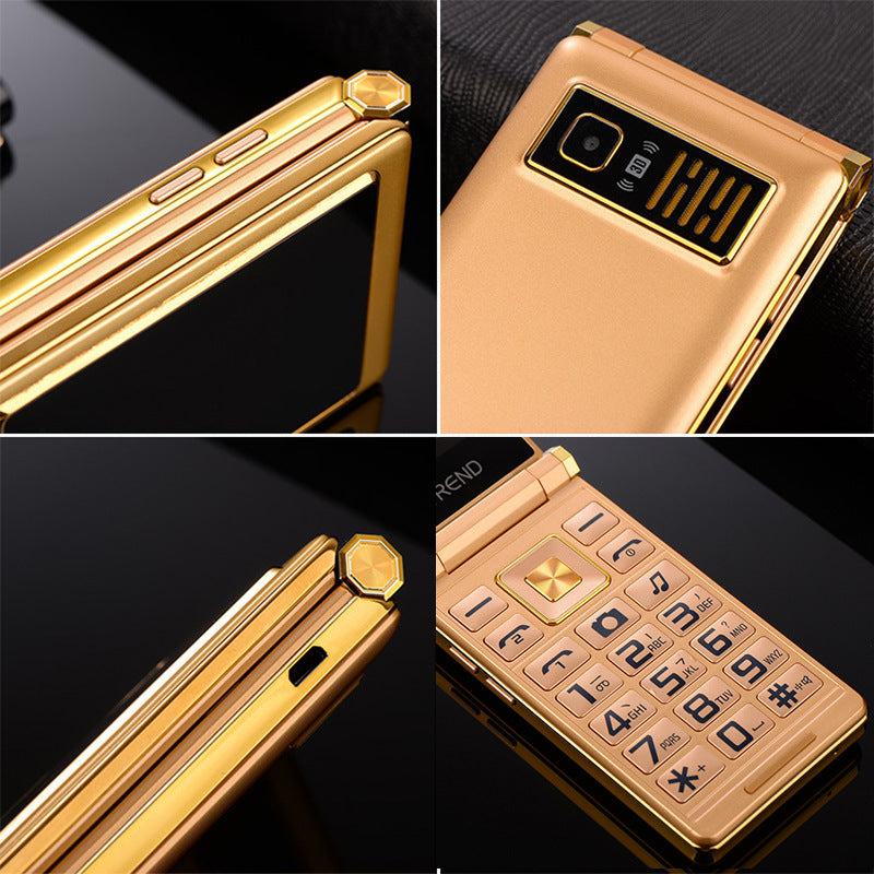 Gold flip phone with keypad on a black background