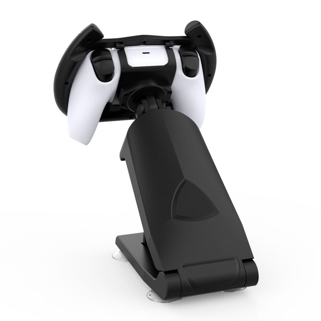 Black and white gaming controller on a stand with a white background