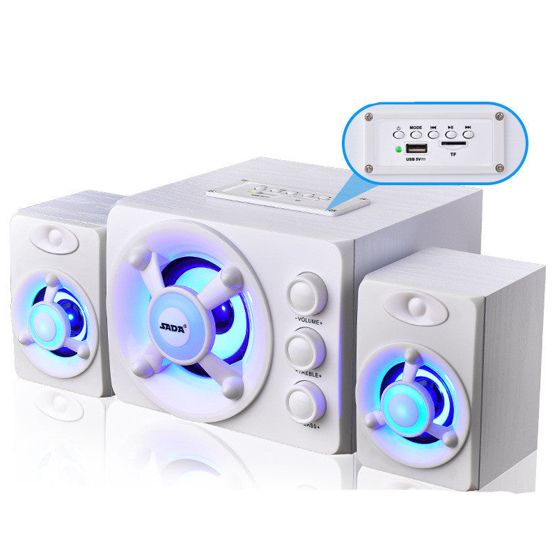 White computer speakers with blue LED lights on a white background
