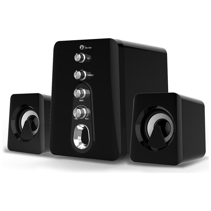 Black speaker system with control knobs on a white background