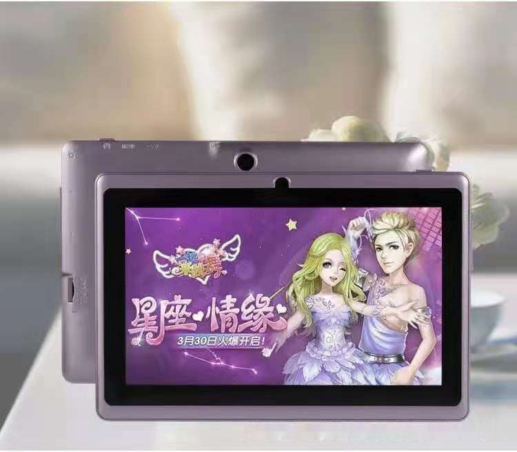 Tablet with a colorful display featuring characters and text on a blurred background