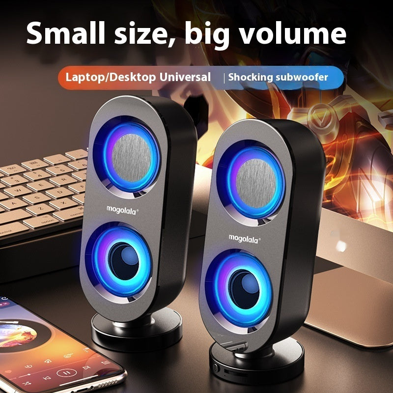 Two speakers with colorful lights on a desk with text 'Small size, big volume'.