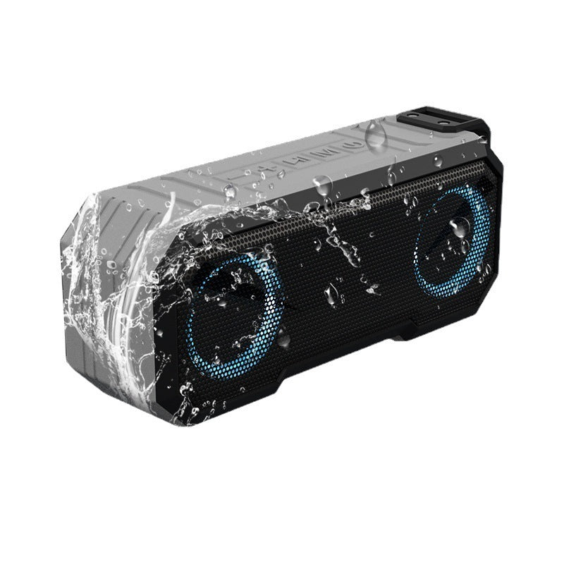 Water-resistant portable speaker with blue lights on a white background