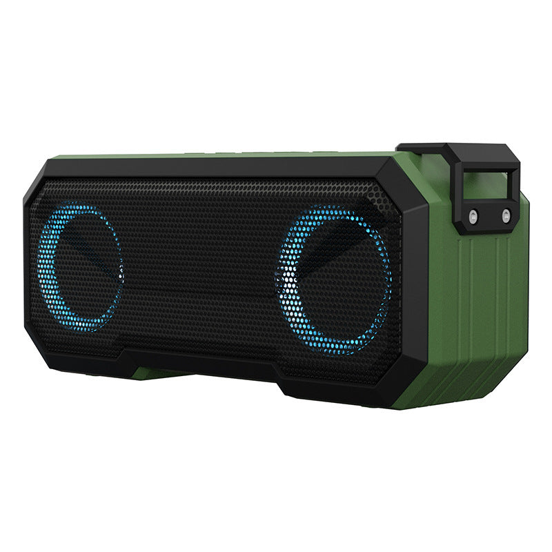 Green and black portable speaker with blue LED lights on a white background