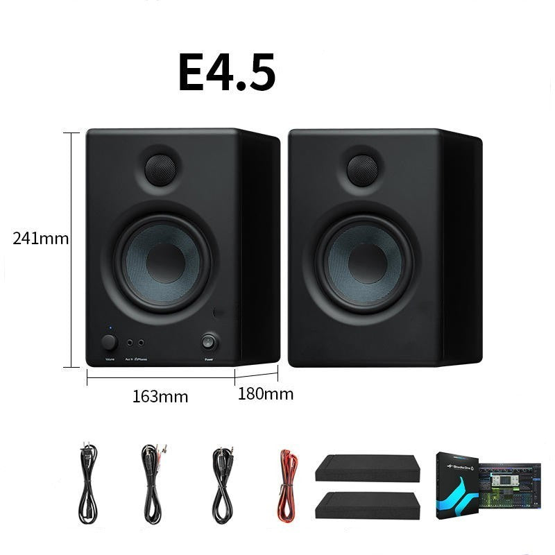 Pair of black studio monitors with dimensions and included accessories on a white background